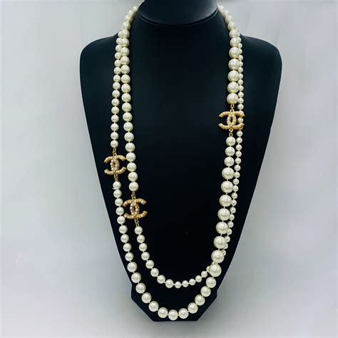 chanel black logo necklace|long Chanel necklace with pearls.